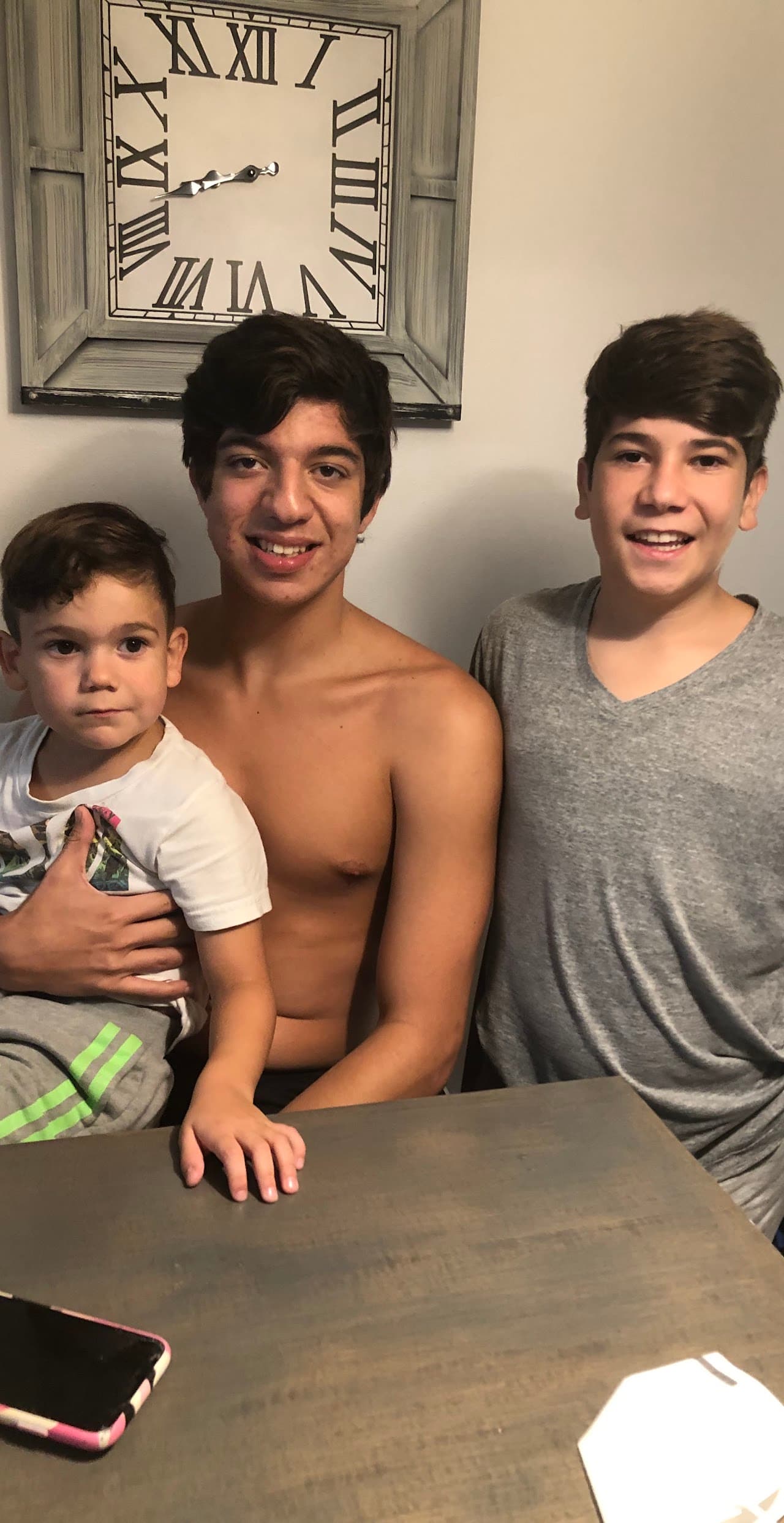 Ryan and his little brother making funny faces