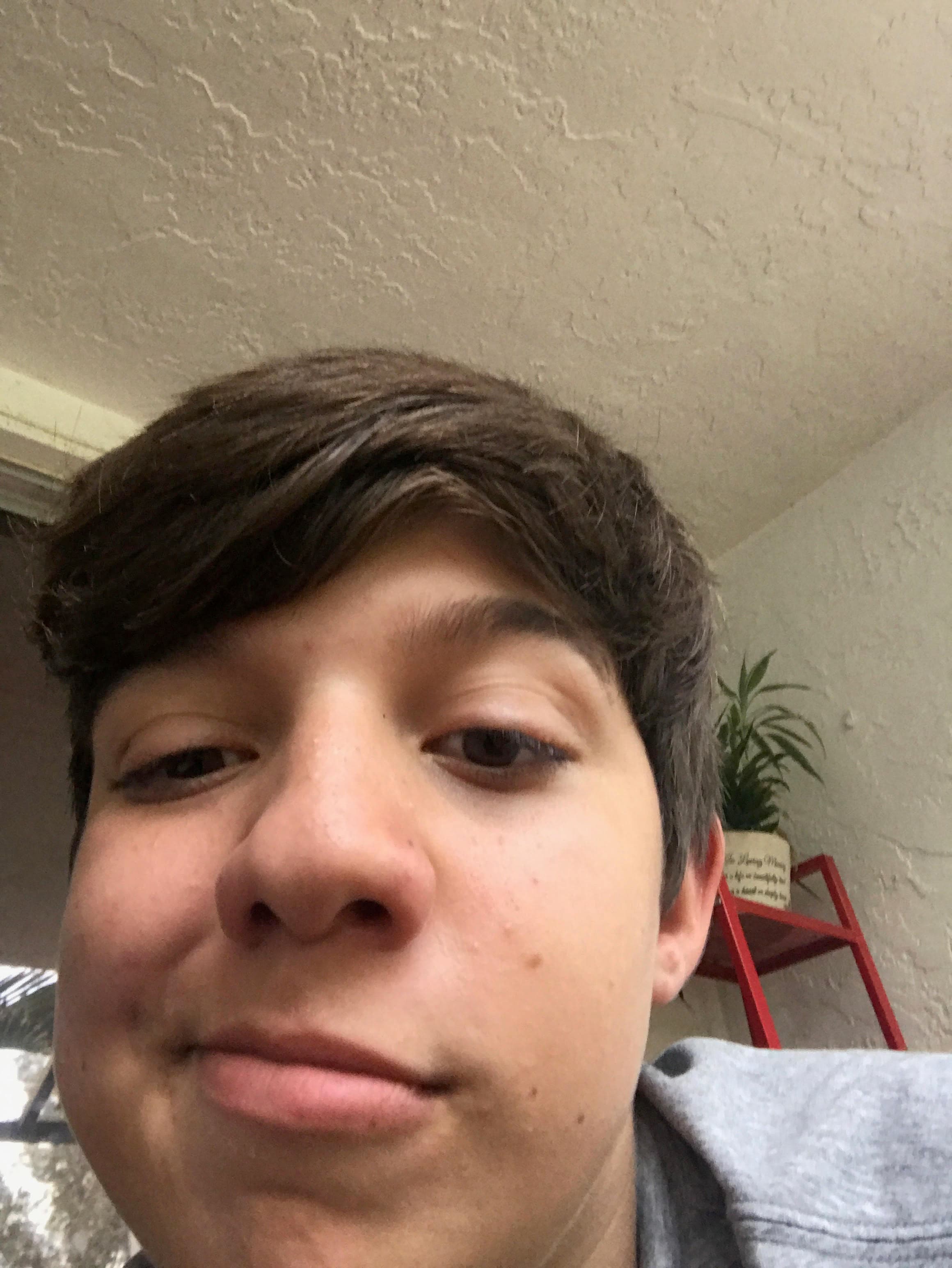 Ryan close-up selfie at home